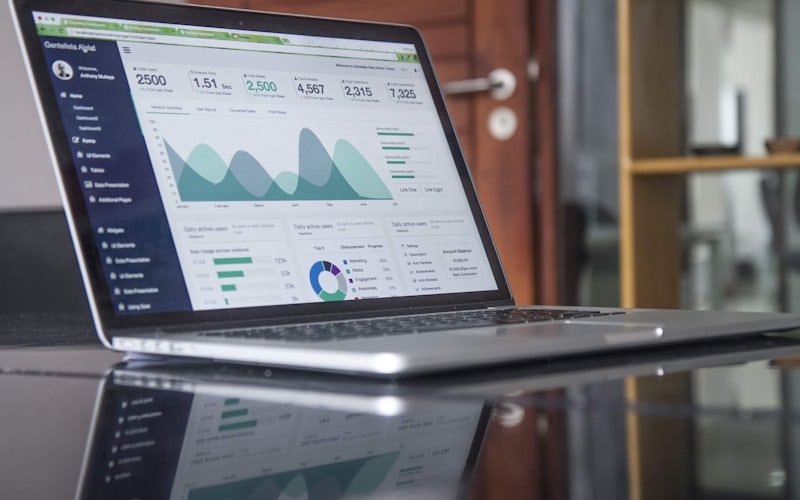 Laptop on a desk — why your small business needs a website